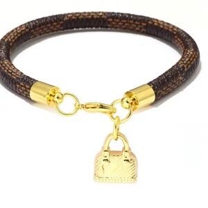 Anthropologie Gold and Brown Bracelet with Bag Charm